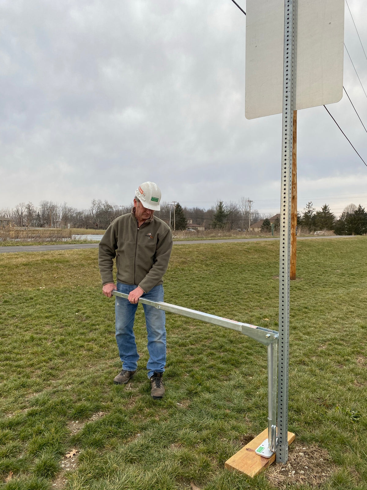 Use a wood board on soft soil